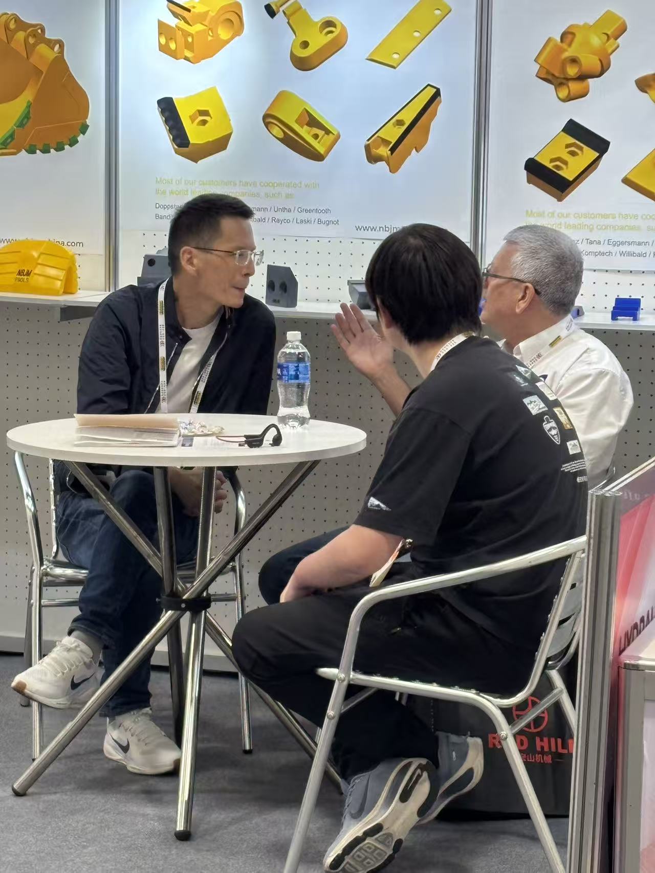 NBJM team discussing customized G.E.T parts with global clients at Las Vegas show 2026